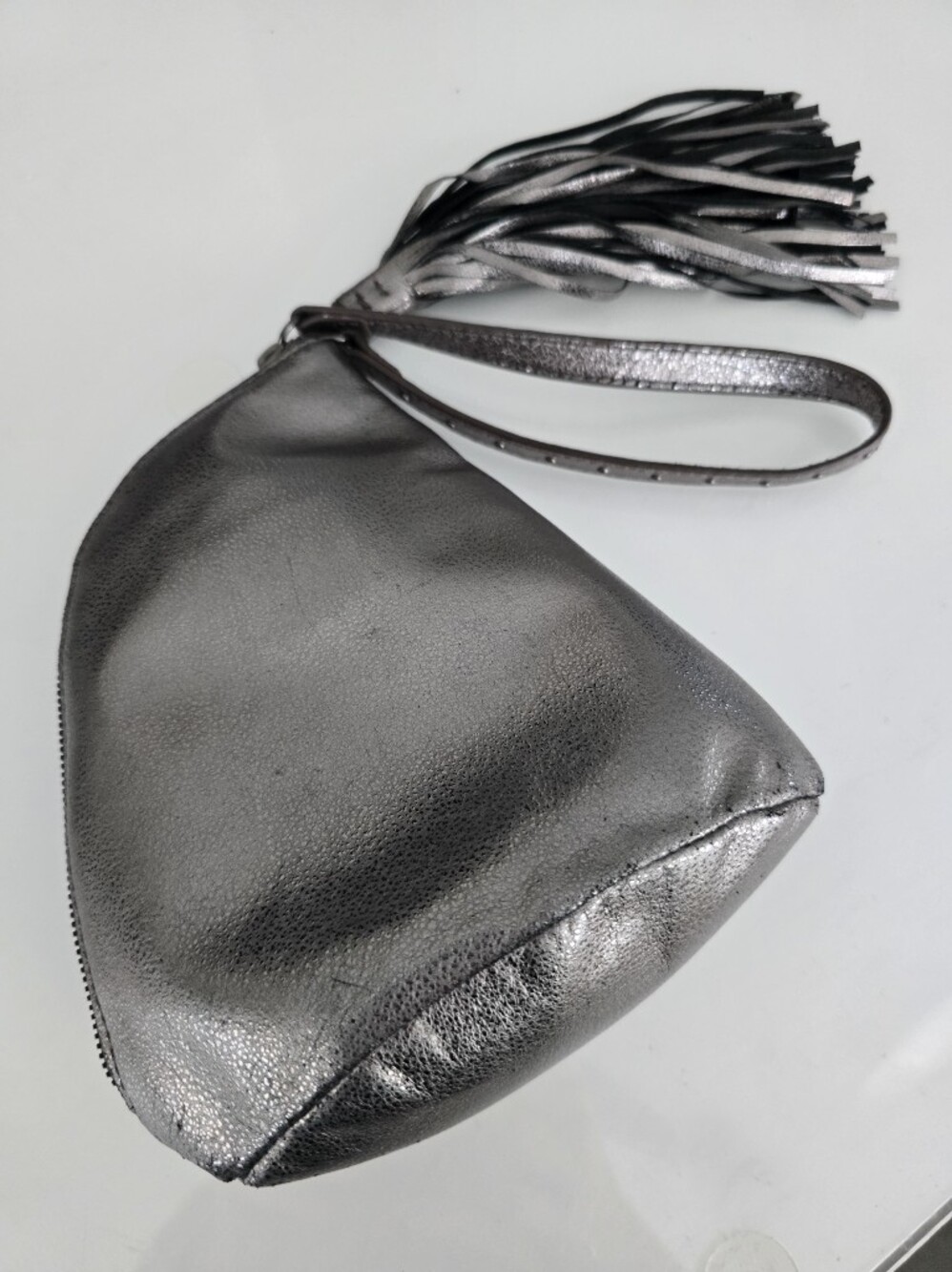 HOBO The Original Metallic Leather Wristlet Clutch Hematite Fringe Tassel